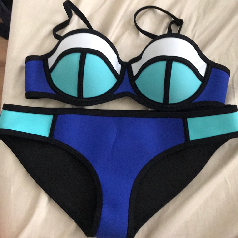 Triangl swimsuit. Both Med. great condition